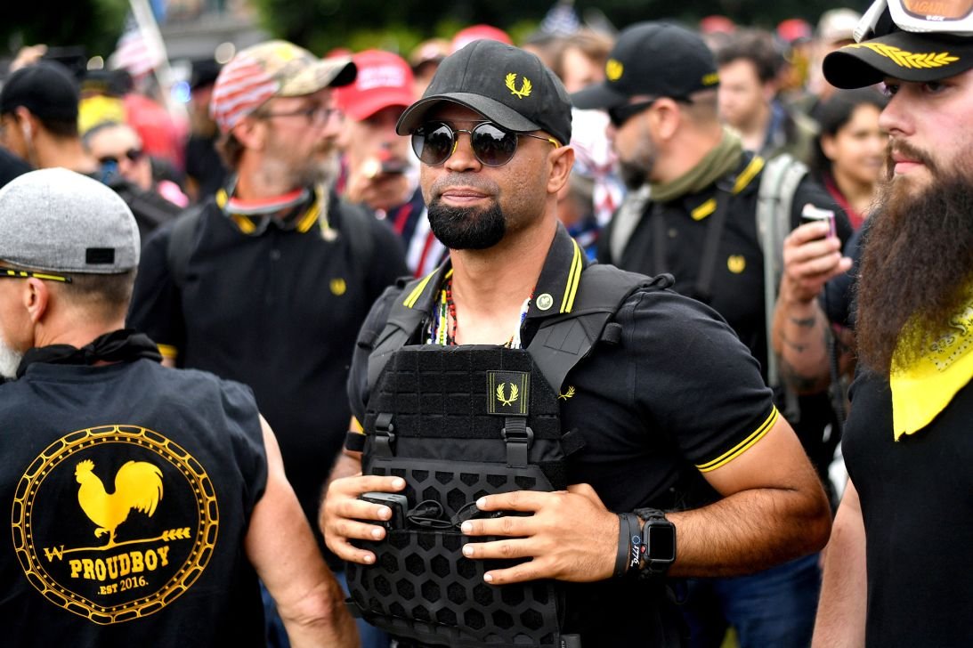 Enrique Tarrio, chair of the Proud Boys organization from 2018-2021, wears Fred Perry while rallying in Portland, Oregon in August 2019.
