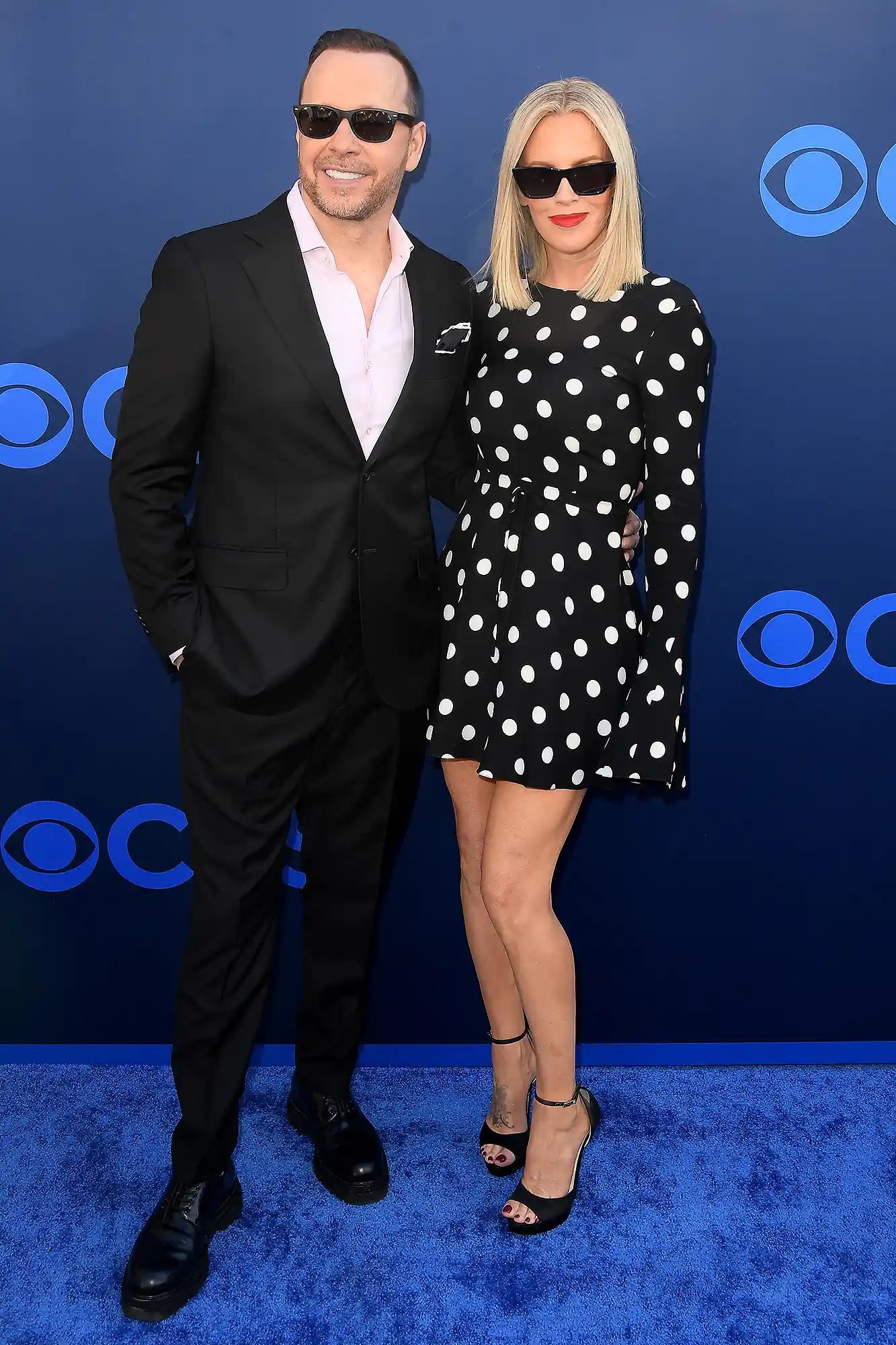 LOS ANGELES, CALIFORNIA - MAY 07: Donnie Wahlberg and Jenny McCarthy arrive at the CBS Fest 2025 at Paramount Studios on May 07, 2025, in Los Angeles, California.