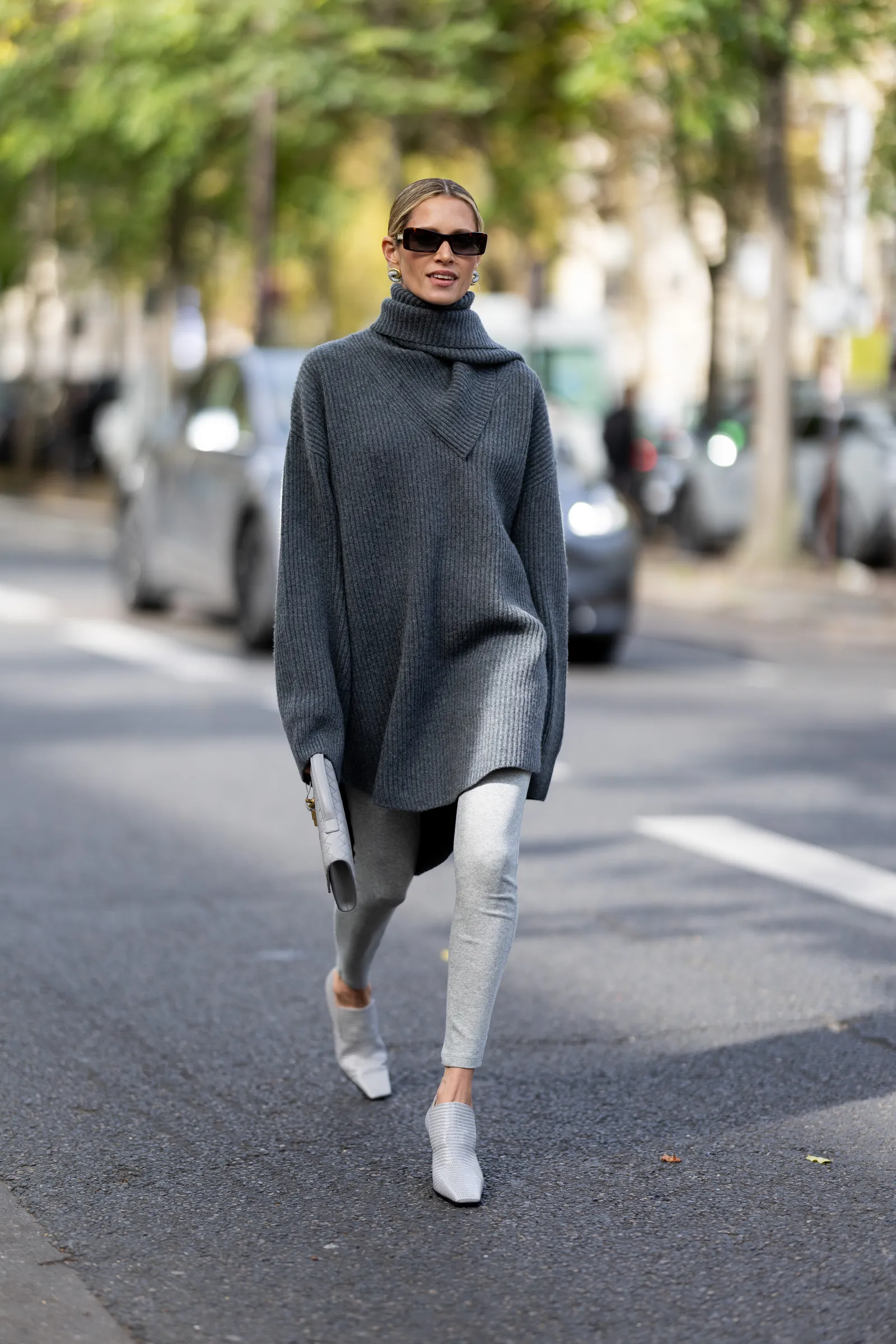 PARIS FRANCE  SEPTEMBER 30 Helena Bordon wears black sunglasses a grey turtle neck long sweater grey leggins a grey...