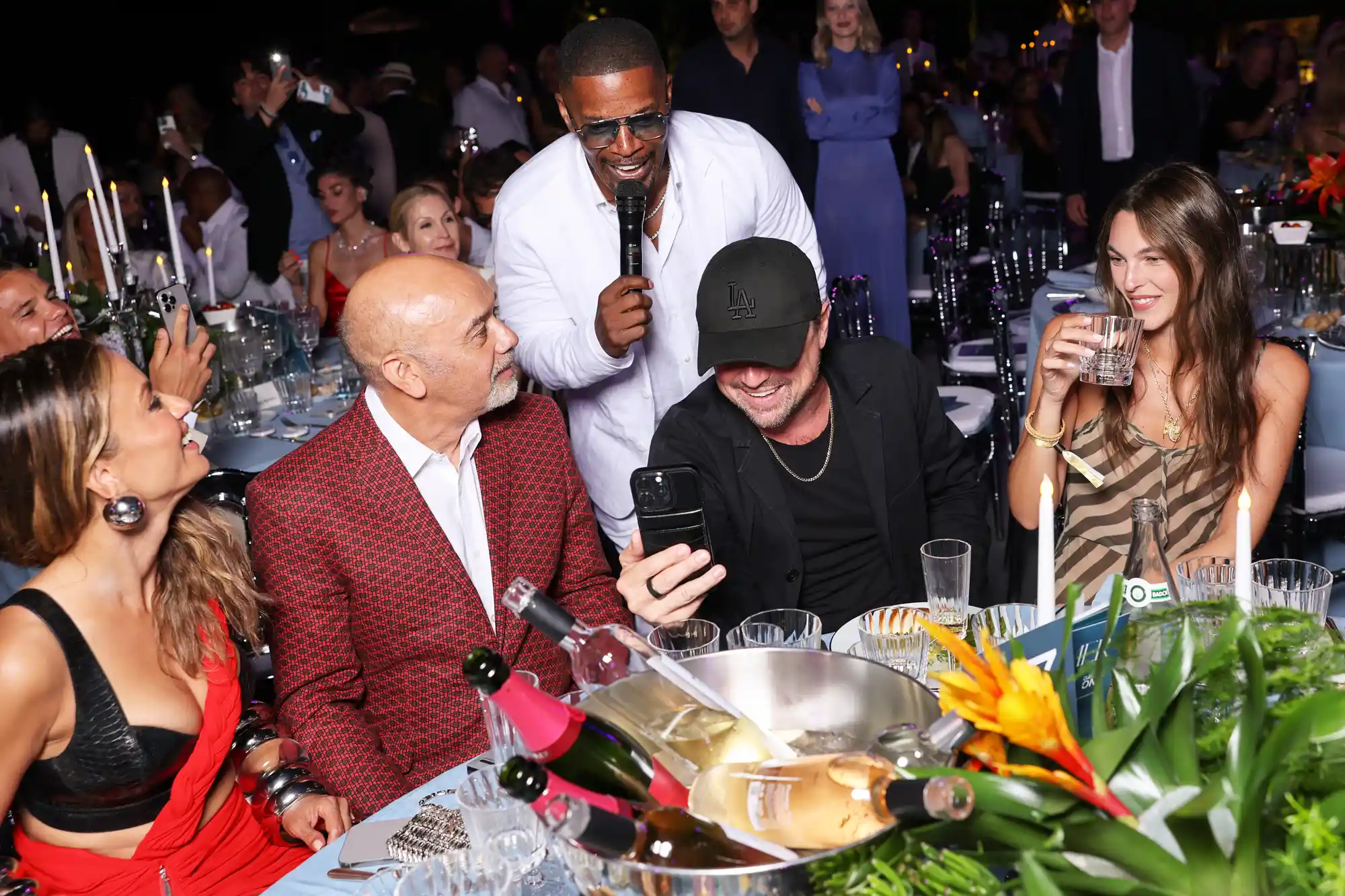 Natasha Poonawalla, Christian Louboutin, Jamie Foxx, Leonardo DiCaprio, and Vittoria Ceretti at the Summer Gala.