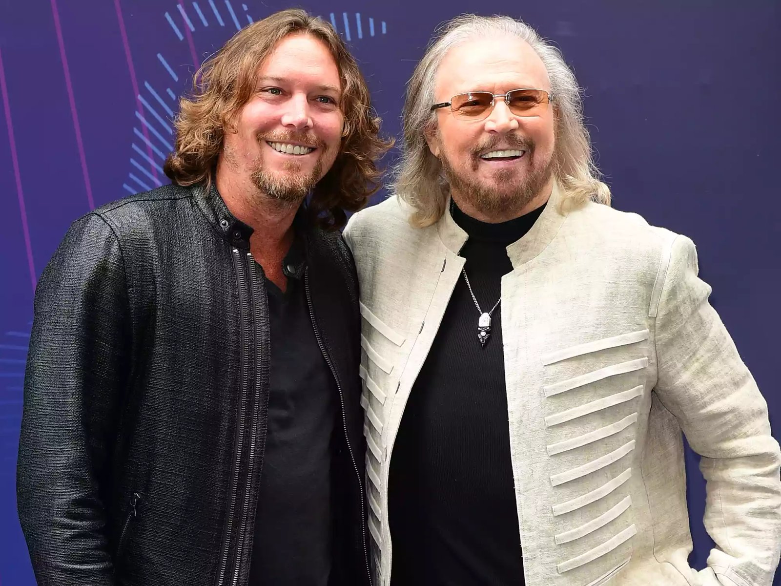 Ashley Gibb and Barry Gibb attending the O2 Silver Clef Awards 2017 held at the Grosvenor House Hotel, London.