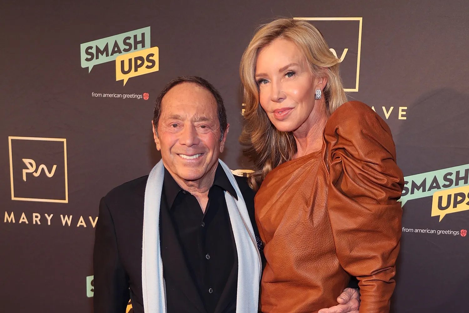 Paul Anka and Lisa Pemberton attend Primary Wave 13th Annual Pre-GRAMMY Bash on February 9, 2019, in West Hollywood, California.