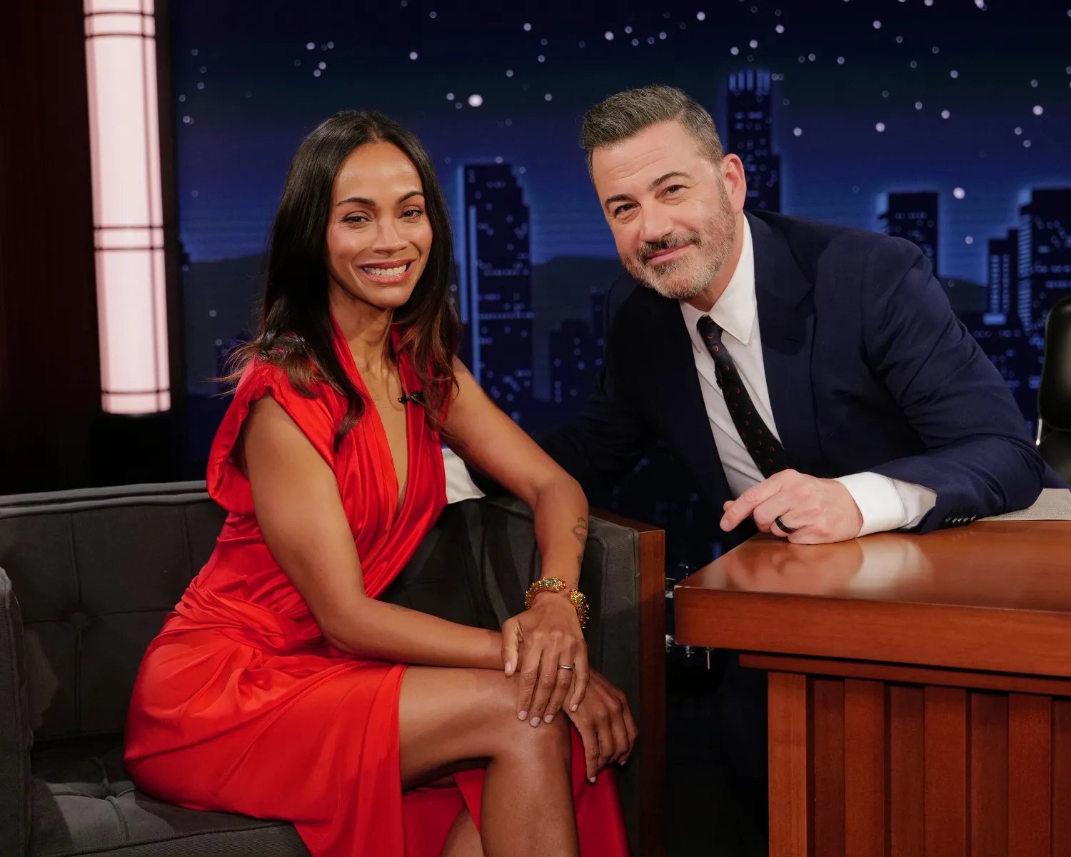 Zoe Saldaña posing with Jimmy Kimmel on Jimmy Kimmel Live!.