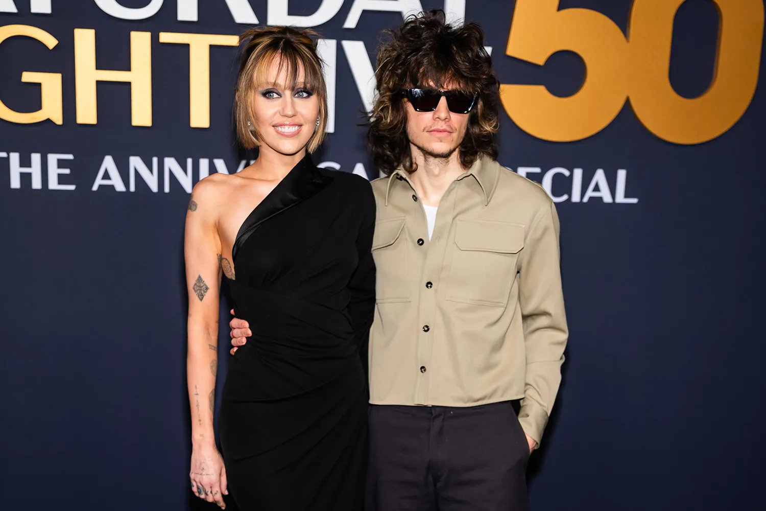 Miley Cyrus (L) and Maxx Morando attend the SNL50: The Anniversary Special