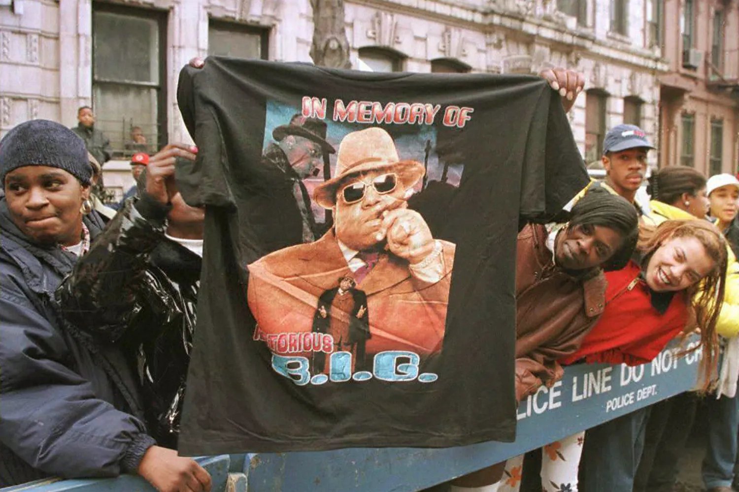 A man displays a T-shirt tribute to rapper Biggie Smalls aka The Notorious B.I.G.