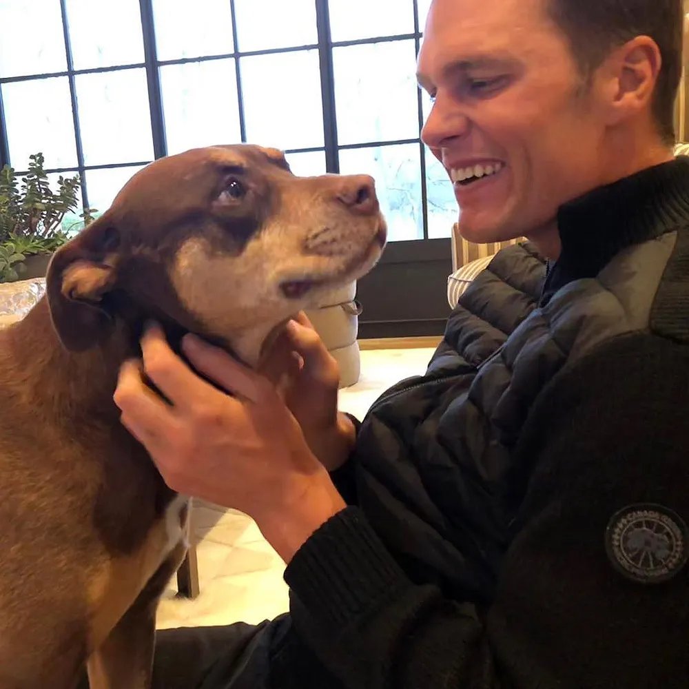 Tom Brady and his dog Lua