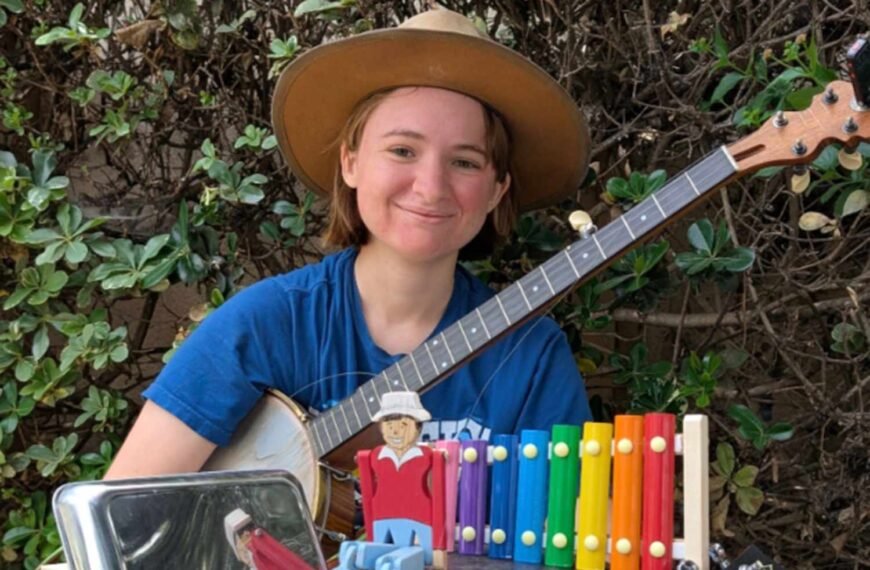 How This Musician's Dancing Partner Adds a Unique Flavor to Her Banjo Performances