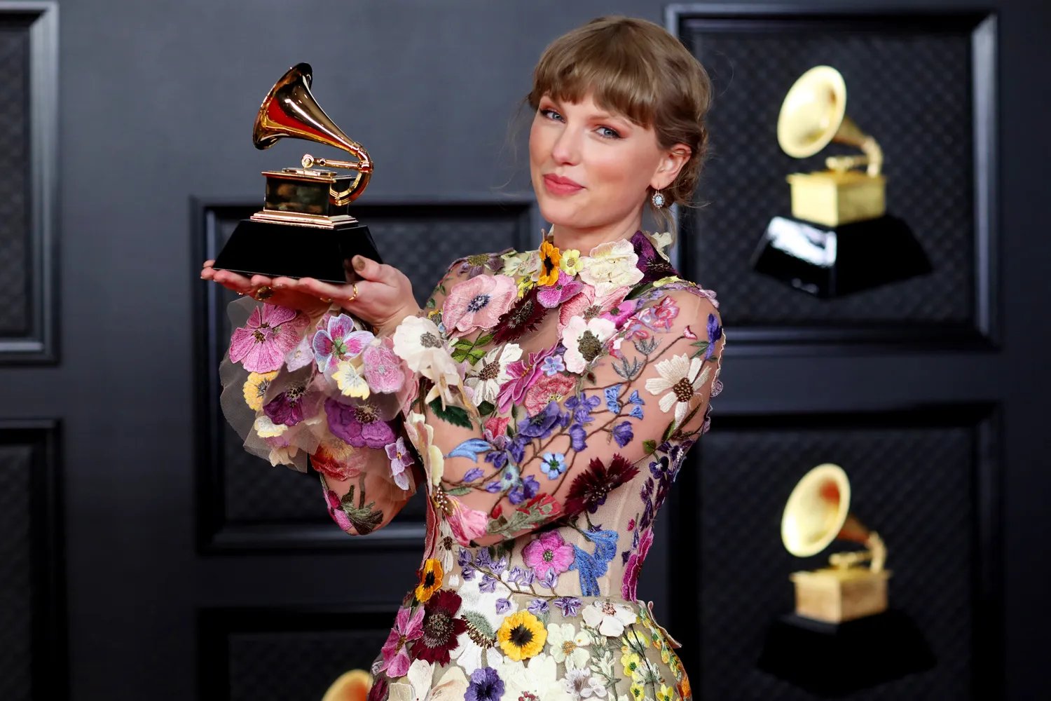 Taylor Swift with her Grammy at the 63rd Annual Grammy Awards on March 14, 2021 in Los Angeles, California.
