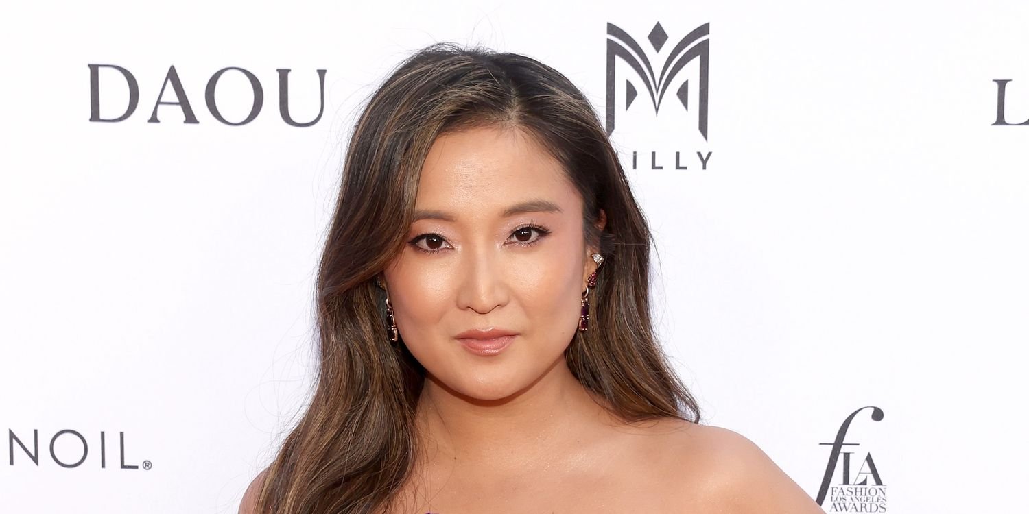 Ashley Park Embraces the Cherry Cola Hair Trend in a Stunning Lingerie-Inspired Corset Gown