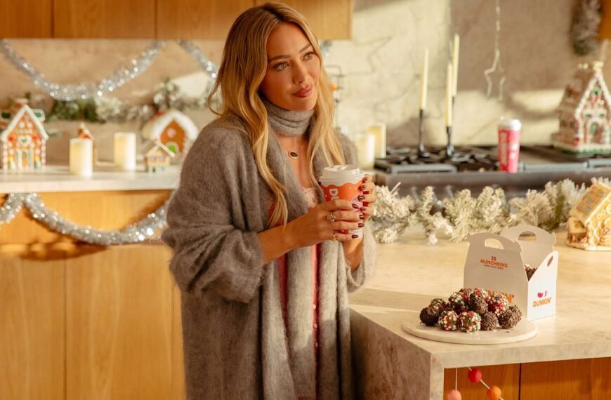 Hilary Duff Teams Up with Talking Munchkins for a Fun New Dunkin’ Ad