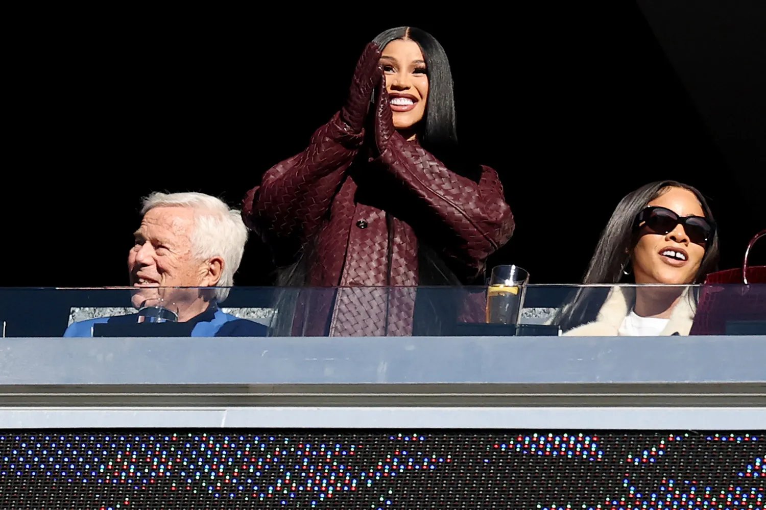 Cardi B cheers during the game between the Atlanta Falcons and the New England Patriots at Gillette Stadium on November 02, 2025. 