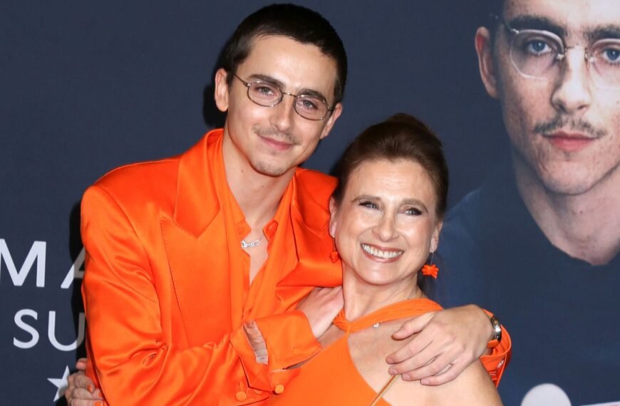 Timothée Chalamet and His Mom Shine in Matching Orange Outfits at the 'Marty Supreme' Premiere in New York City