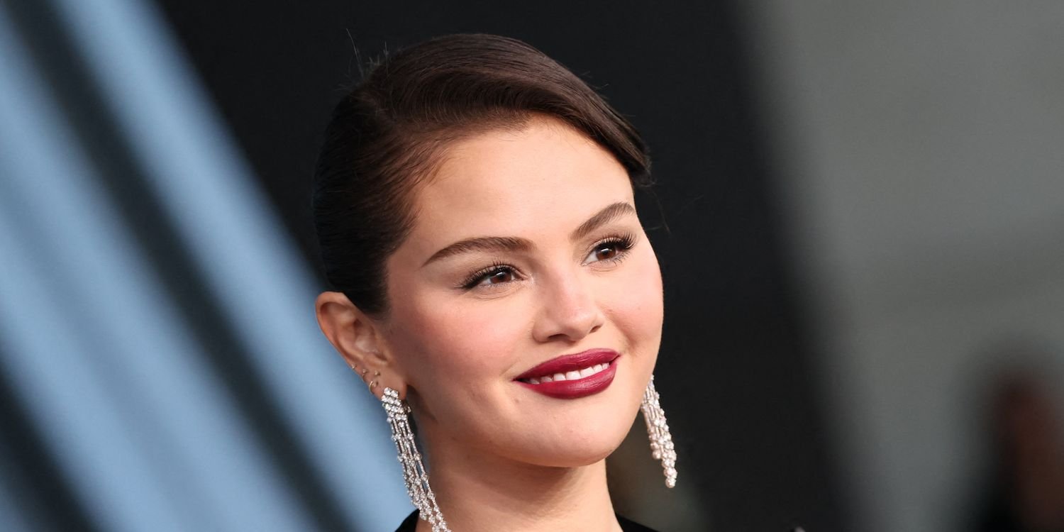 Selena Gomez Shines in a Festive Lace-Trimmed Little Black Dress and Sheer Black Tights