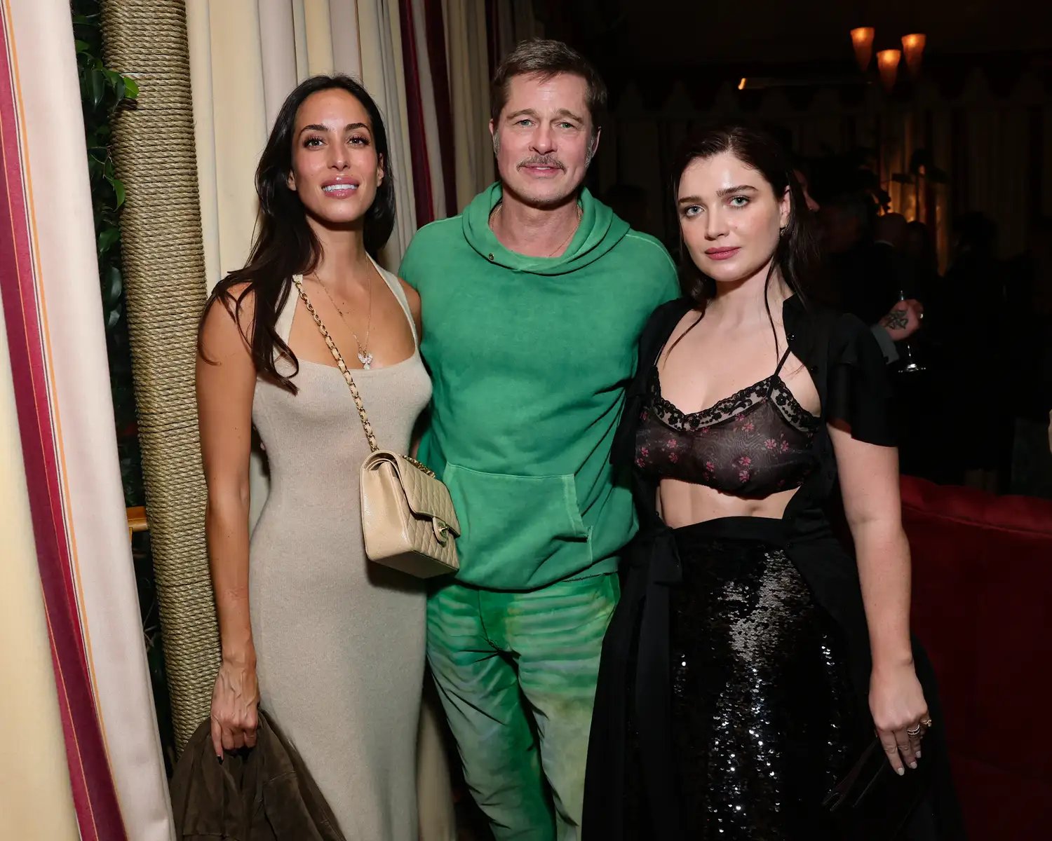 Ines de Ramon, Brad Pitt, and Eve Hewson on November 11, 2025.