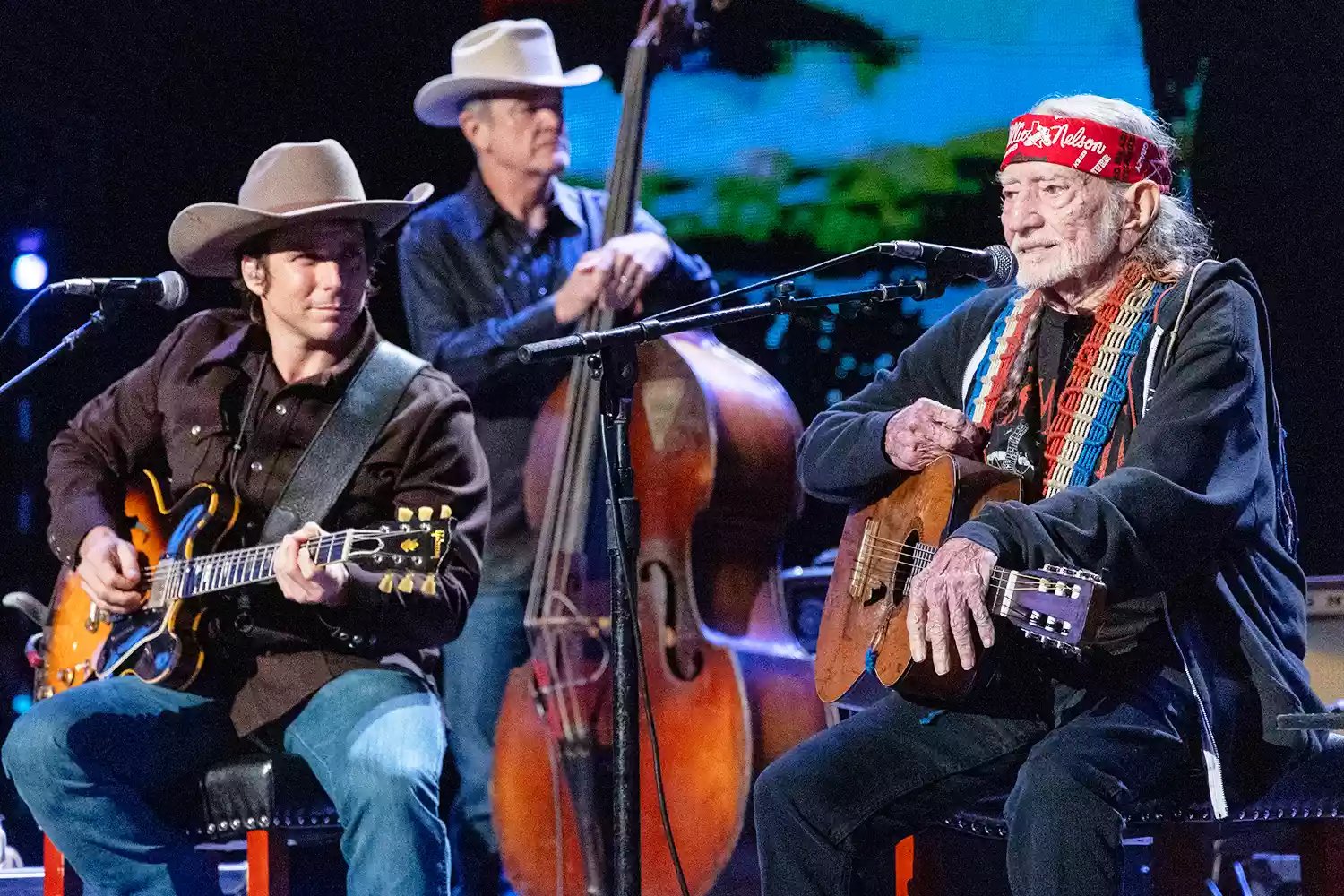 (L - R) Lukas Nelson, Kevin Smith and Willie Nelson perform in concert during Farm Aid 2024 at Saratoga Performing Arts Center on September 21, 2024 in Saratoga Springs, New York.