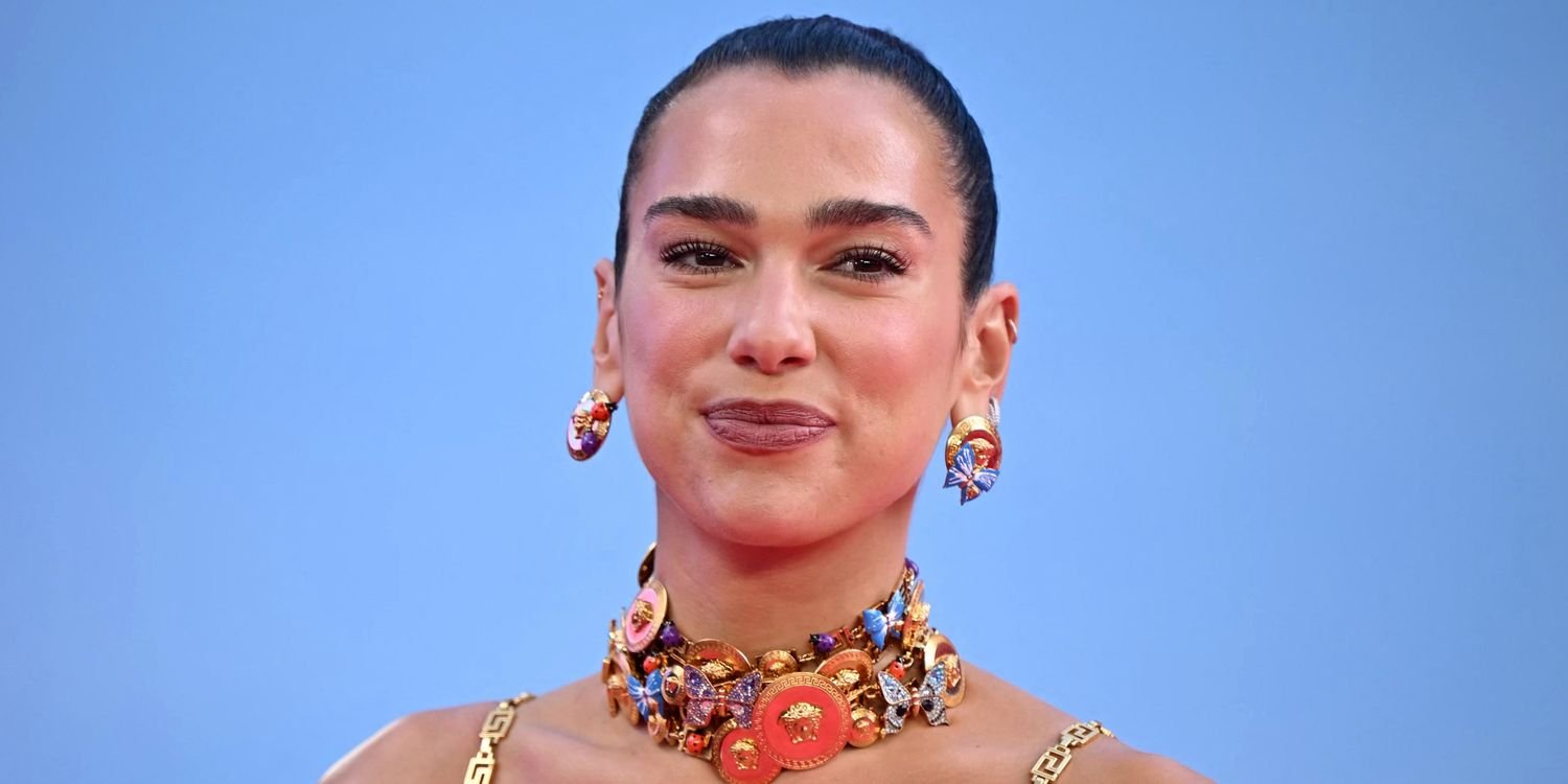 Dua Lipa Looks Stylish in a Navy Blue Bodysuit and Sheer Tights