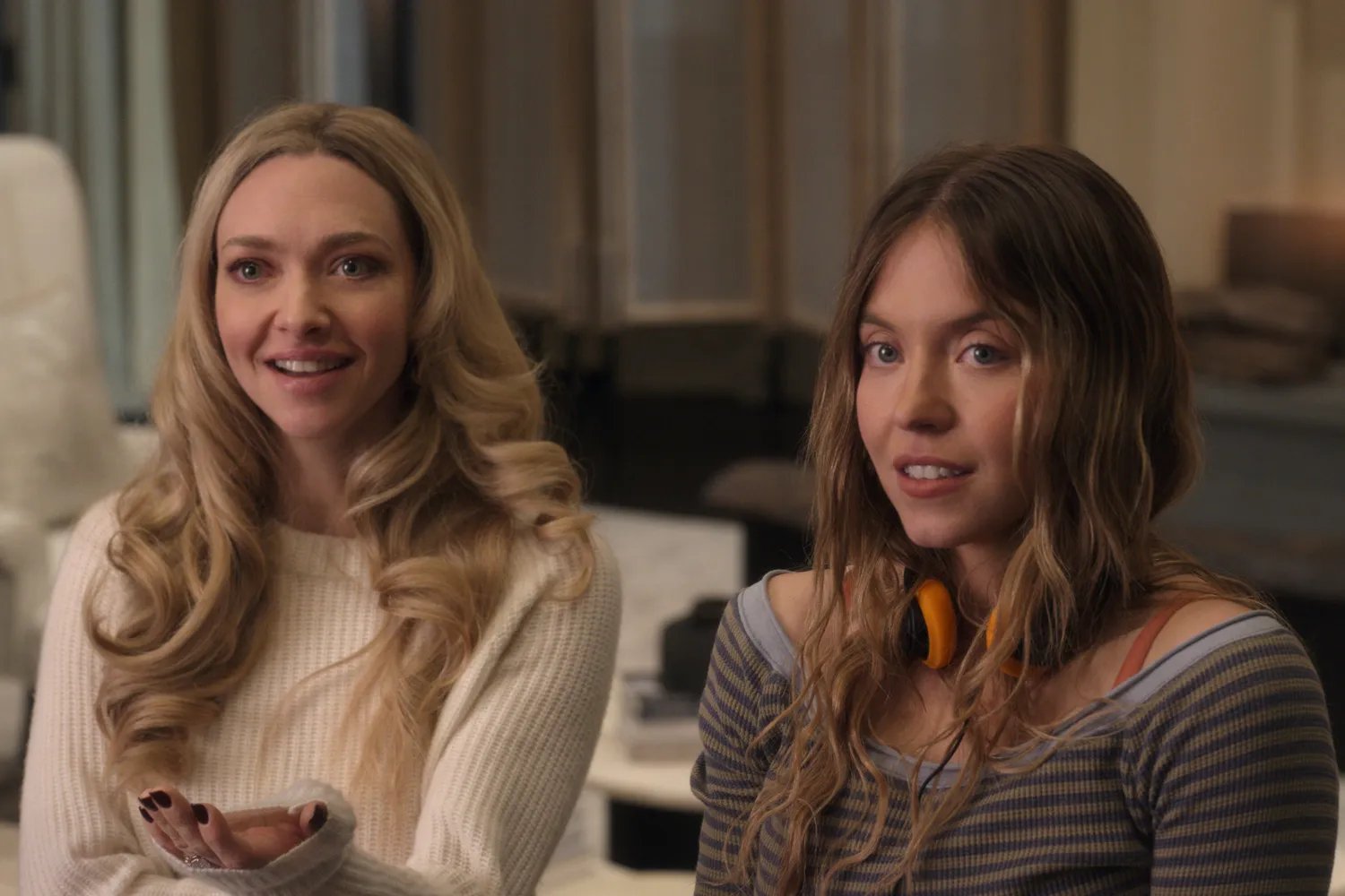 Amanda Seyfried as Nina Winchester and Sydney Sweeney as Millie Calloway in The Housemaid