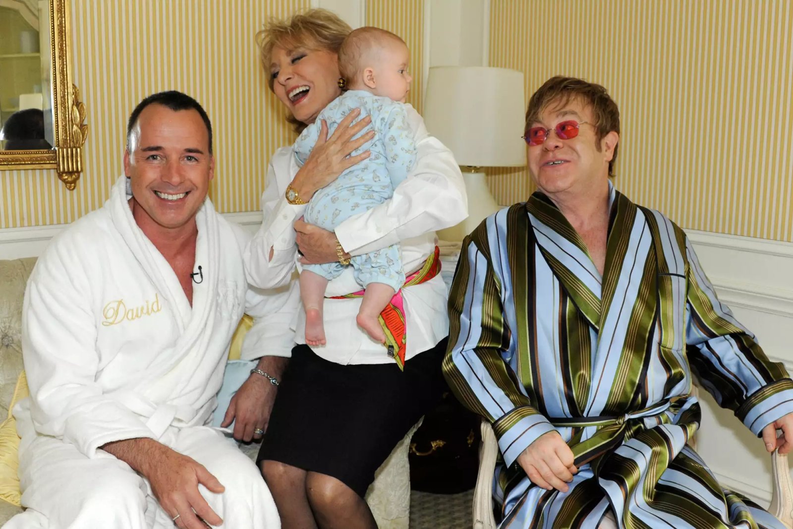 DAVID FURNISH, BARBARA WALTERS, BABY ZACHARY, SIR ELTON JOHN