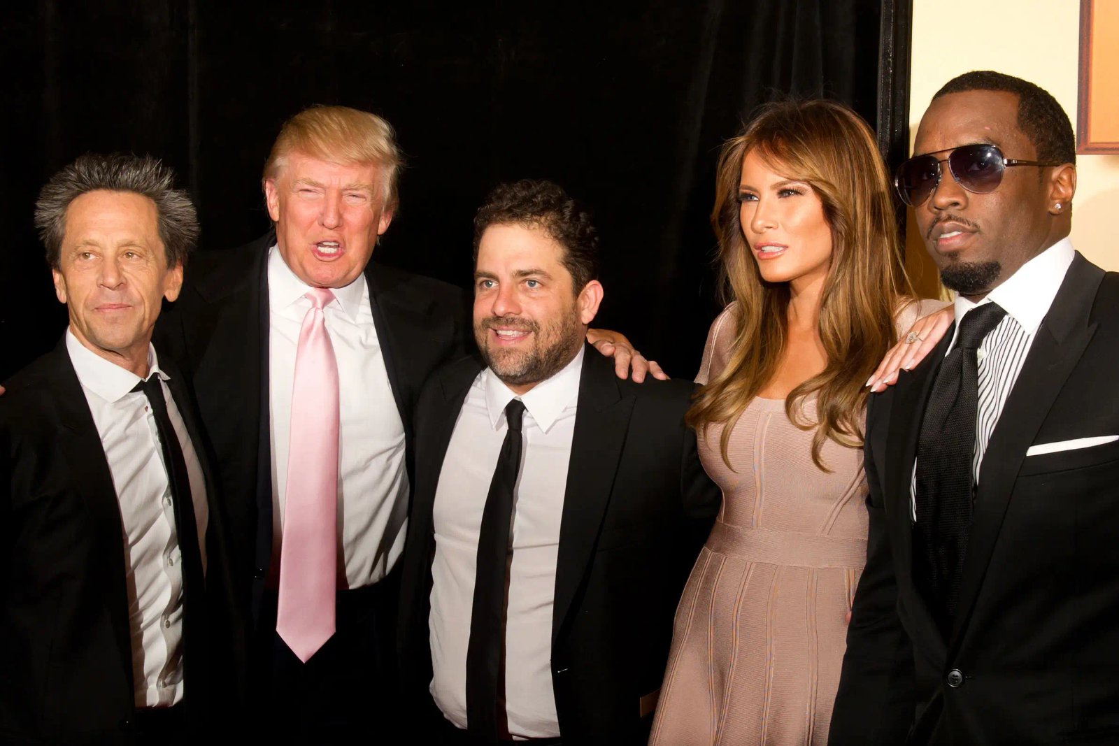Producer Brian Grazer, Donald Trump, Director Brett Ratner, Melania Trump and Sean 'Diddy' Combs attend the world premiere of 'Tower Heist' at the Ziegfeld Theatre on October 24, 2011 in New York City.