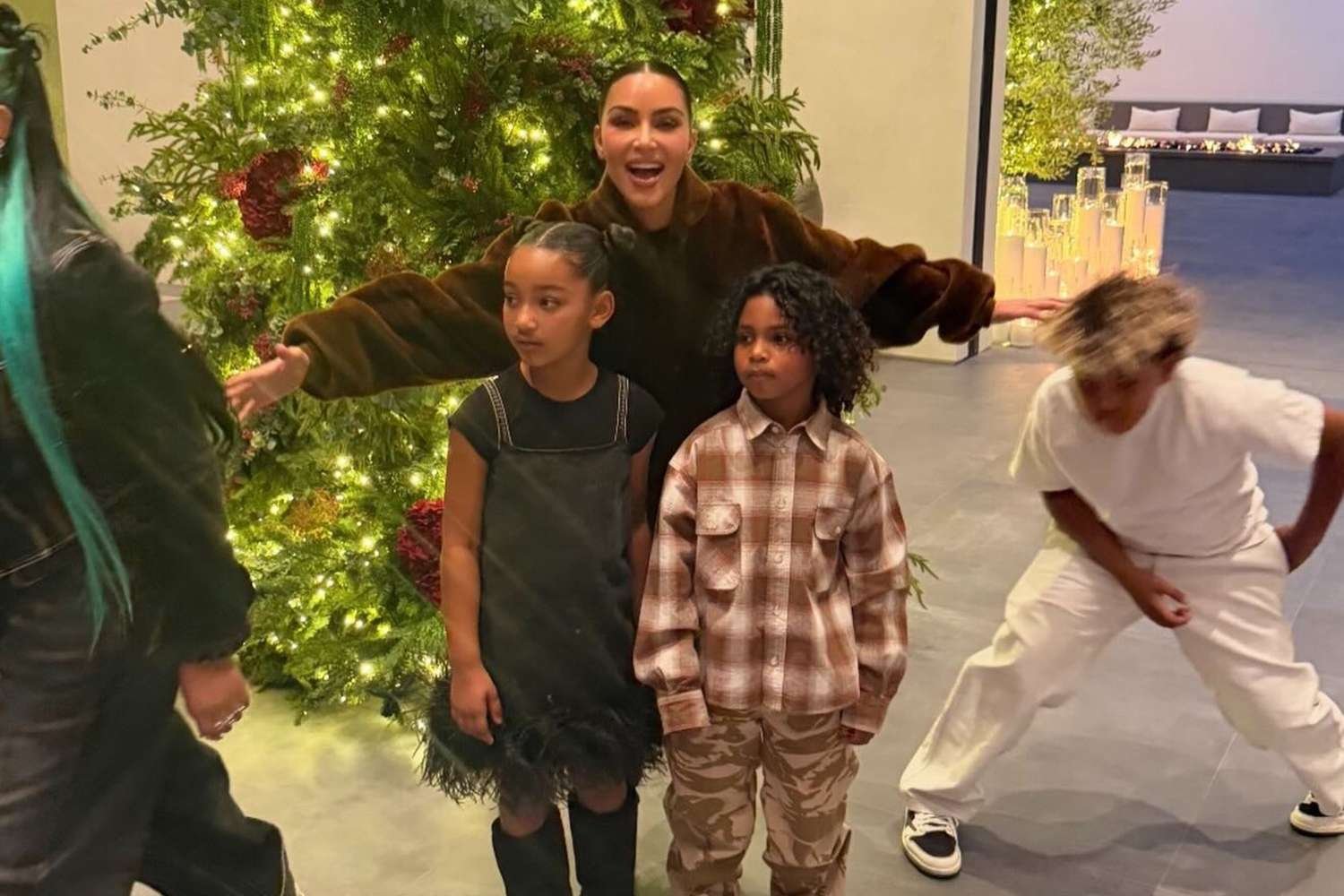 Kim Kardashian Shares a Funny Moment Trying to Snap a Photo with Her Kids