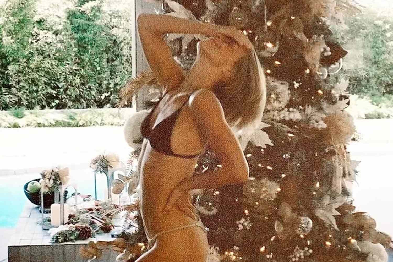 Julianne Hough Celebrates the Holidays in a Fun Bikini by the Christmas Tree