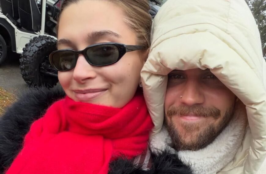 Justin Bieber and Hailey Share a Sweet Christmas Moment in Coordinating Coats