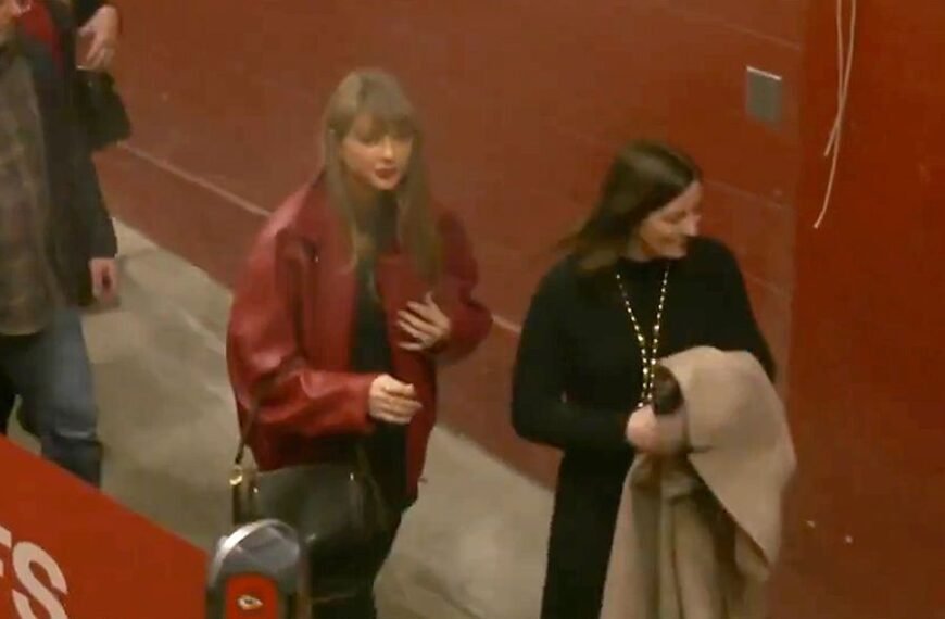 Taylor Swift Wears Her Iconic Red Lipstick with a Stylish Bomber Jacket at Travis Kelce's Christmas Day Game