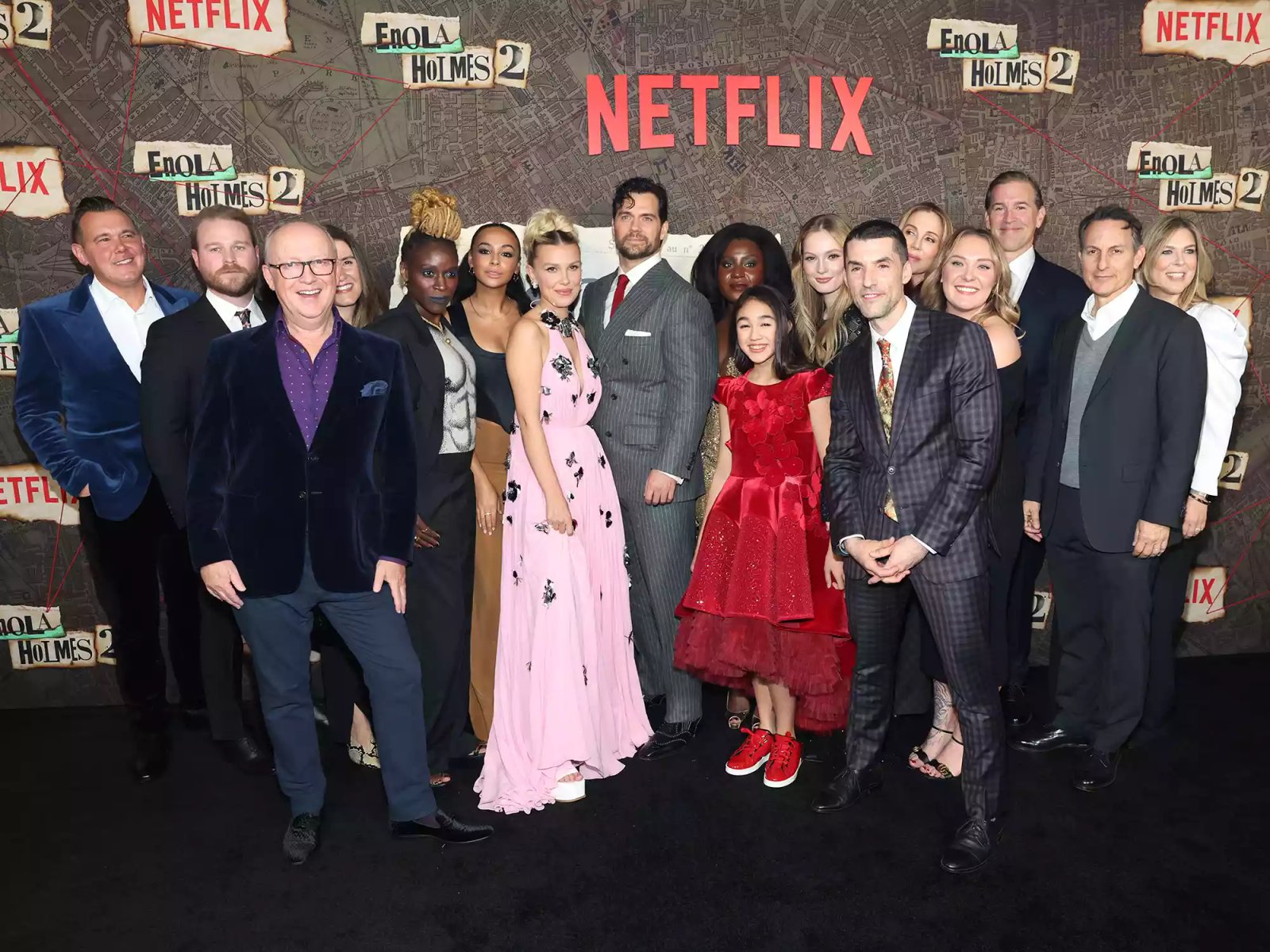 Robert Brown, Harry Bradbeer, Sharon Duncan-Brewster, Abbie Hern, Millie Bobby Brown, Henry Cavill, Susan Wokoma, Serrana Su-Ling Bliss, Hannah Dodd, Alex Garcia, Mary Parent, Paige Brown, Joshua Grode, Ori Marmur and Kira Goldberg attend the Netflix 'Enola Holmes 2' Premiere