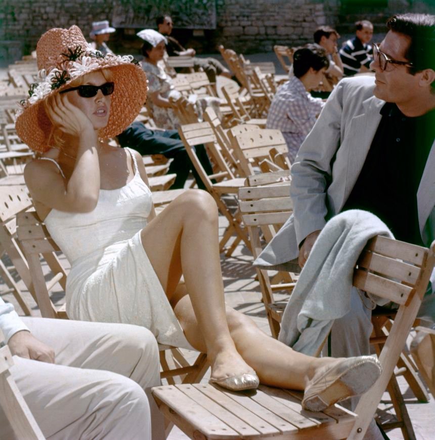 Bardot's fashion featured scooped necklines and ballet flats, enhancing her sensual image.
