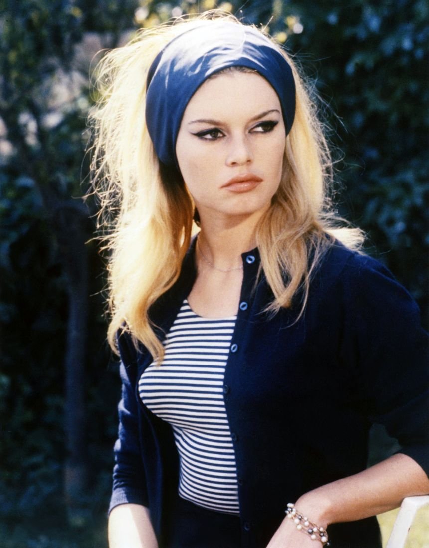 Bardot's stylistic choices often featured Breton stripes and cat-eye liner.