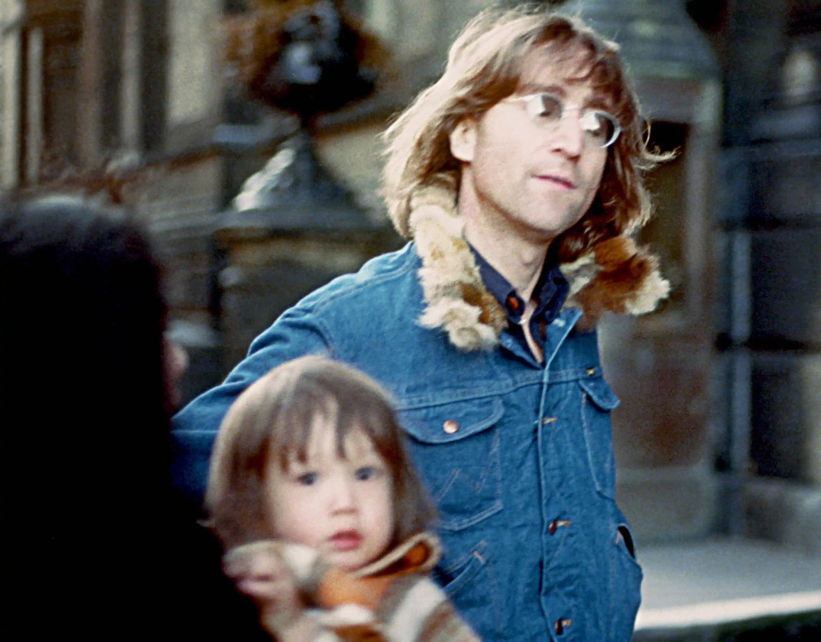 Former Beatle John Lennon poses for a photo with his wife Yoko Ono and son Sean Lennon, New York City, 1977.