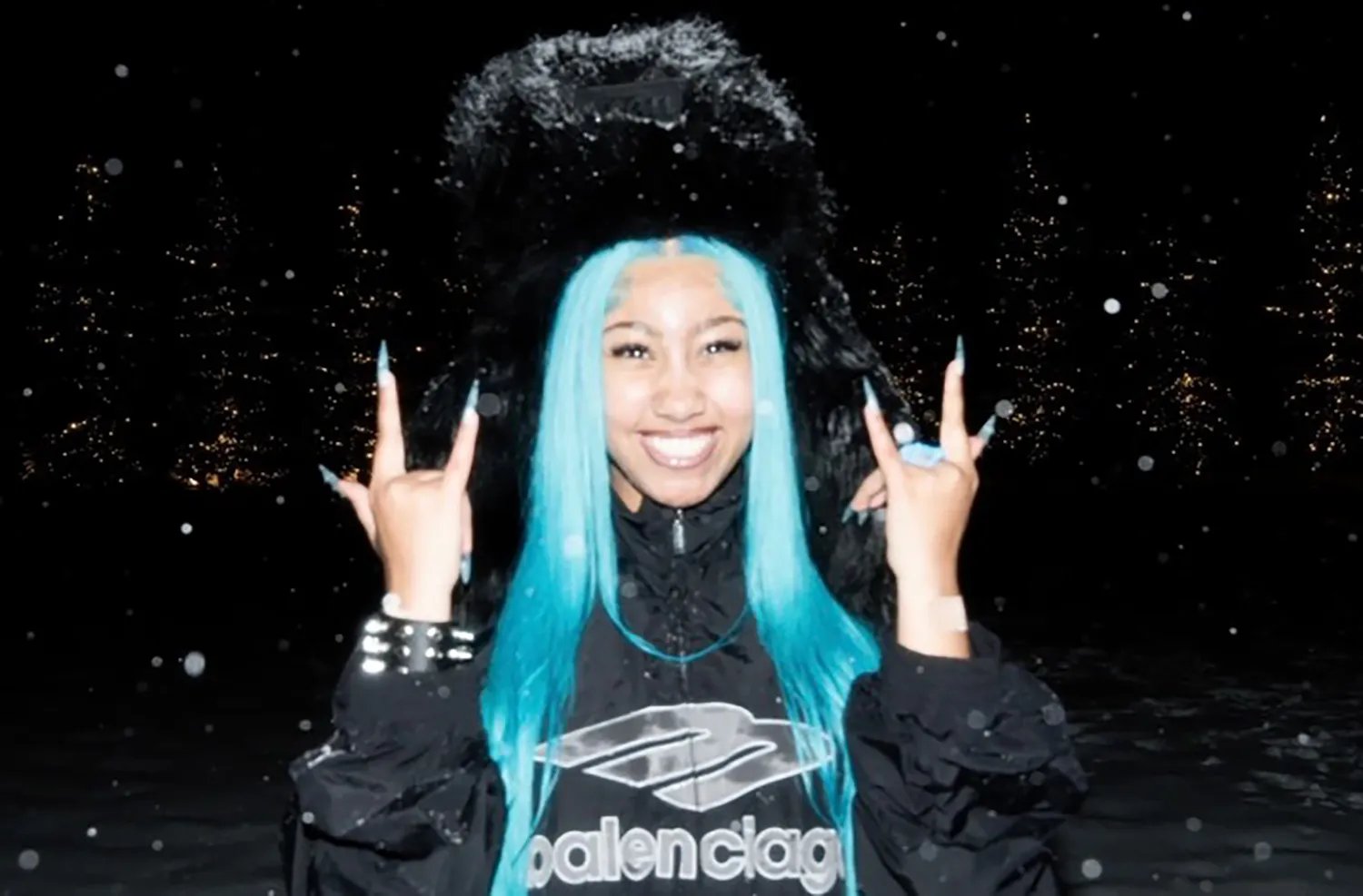 North West rocks blue hair in a photo shoot.