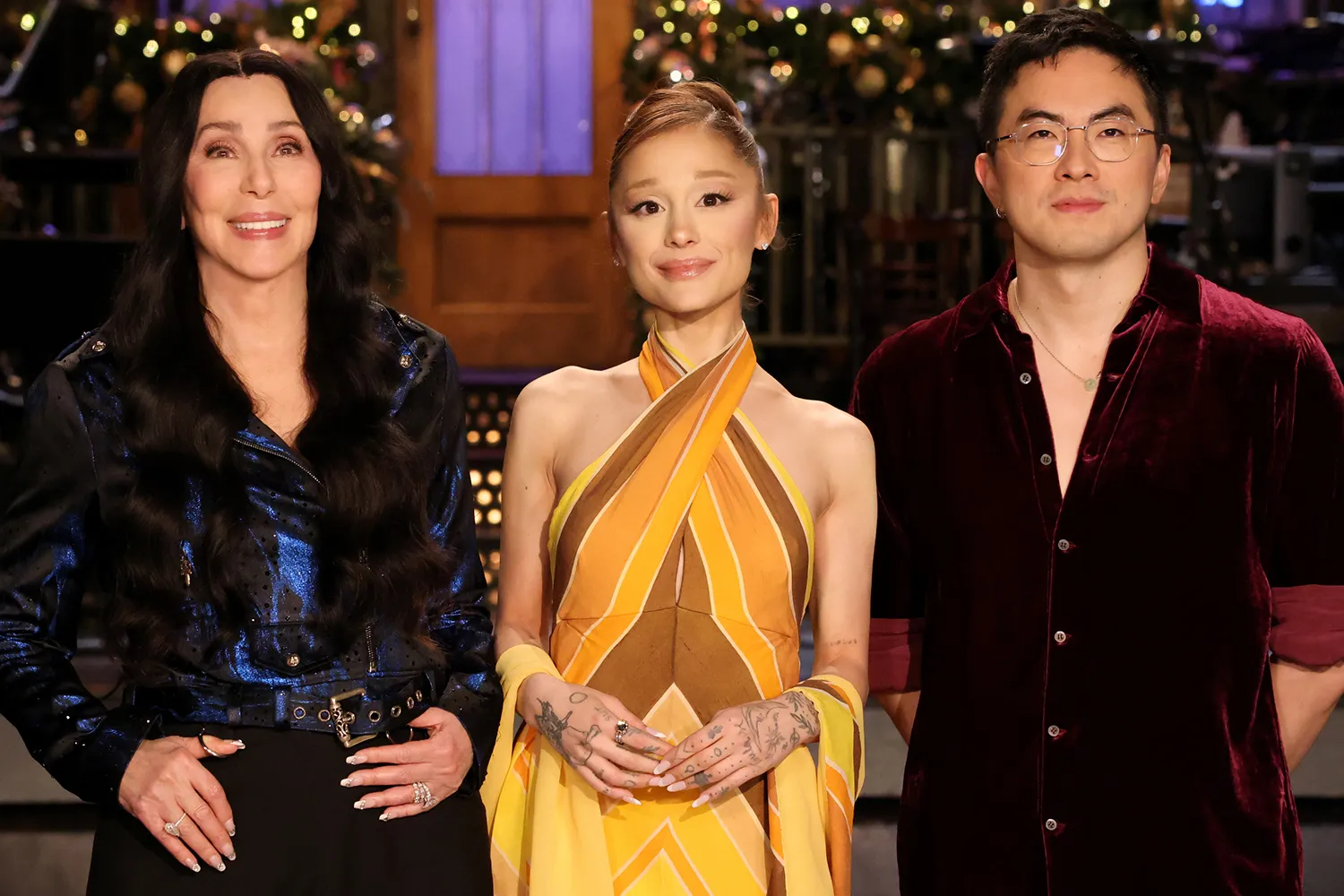 Musical guest Cher, host Ariana Grande, and Bowen Yang during SNL Promos on December 18, 2025 in New York City.