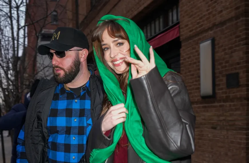 Dakota Johnson Styles Patent Leather Sambas with Cigarette Jeans for a Cozy Christmas Look