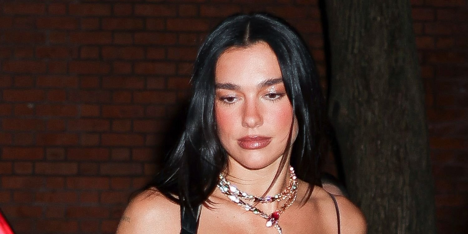 Dua Lipa Shows Off a Bold Look in a Sheer Minidress with Feathers