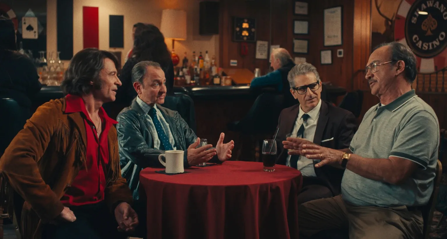 Hugh Jackman, from left, Fisher Stevens, Michael Imperioli and Jim Belushi in a scene from Song Sung Blue.