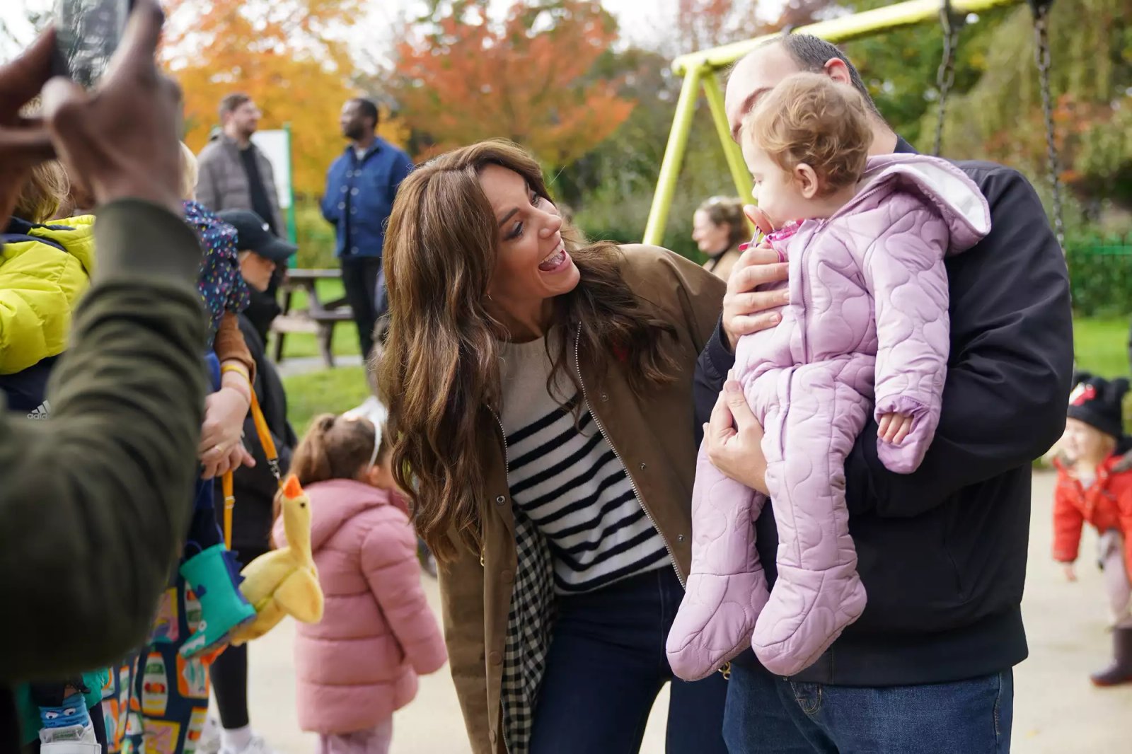 Catherine, Princess of Wales takes part in a Dad Walk in the local park during a visit to Dadvengers