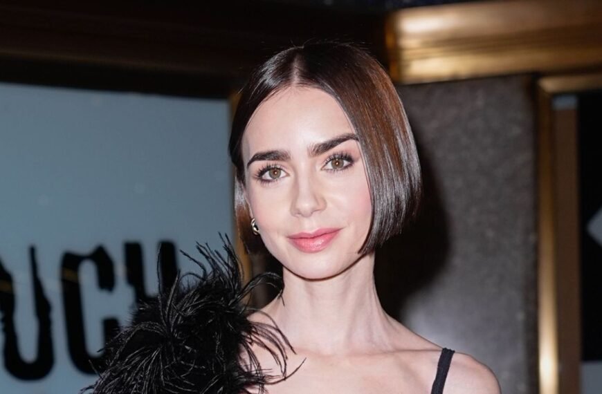 Lily Collins Shows Off a Black Bra Under Her Sheer Black Lace Dress