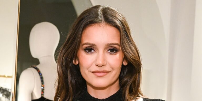 Nina Dobrev Takes a Relaxing Break in a Beautiful Sauna by the Lake in a Stylish Black Bikini