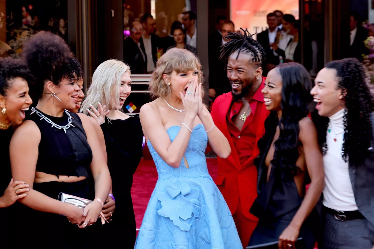 Taylor Swift with dancers and crew attend Taylor Swift: The Eras Tour Concert Movie