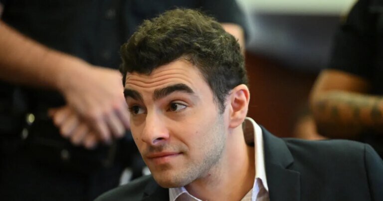 Video Shows Police Questioning Luigi Mangione Before He Heard His Miranda Rights