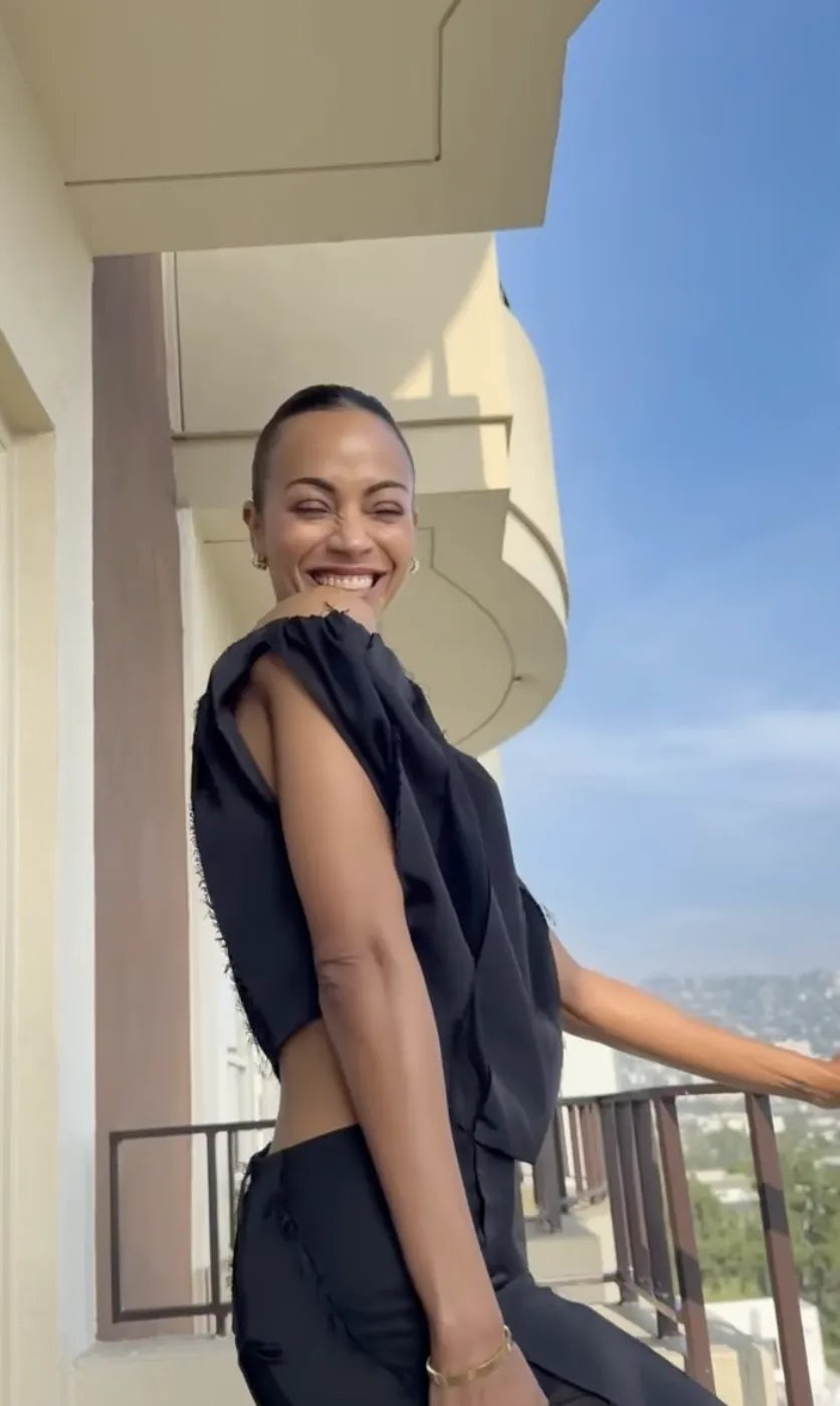 Zoe Saldana in a floaty sheer black crop top