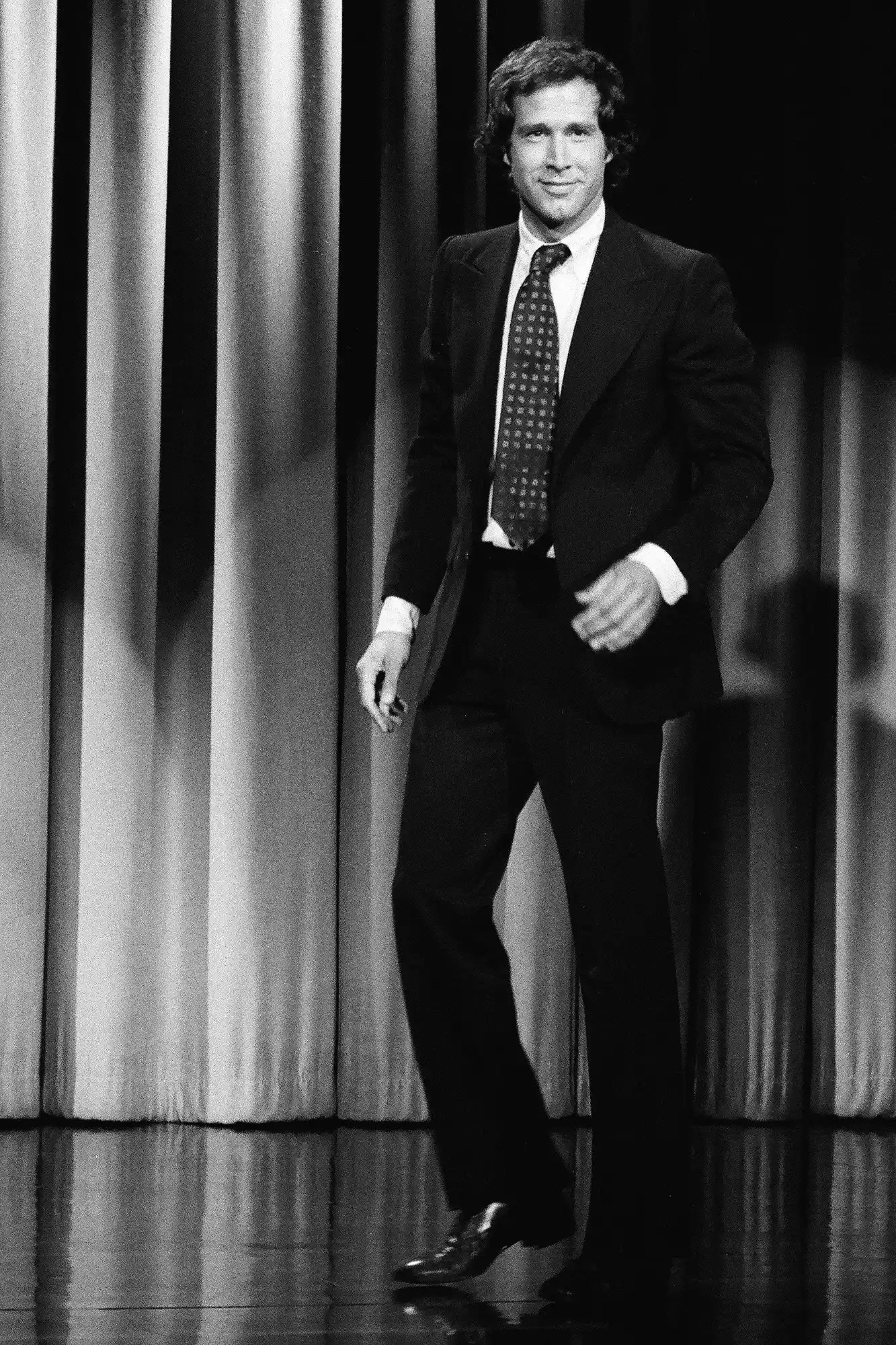 THE TONIGHT SHOW STARRING JOHNNY CARSON -- Pictured: Actor/comedian Chevy Chase during a segment on May 4, 1977