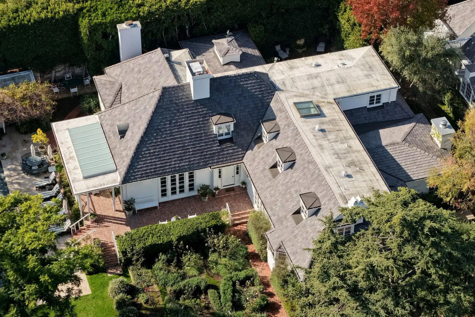 An aerial view of director Rob Reiner's home on December 15, 2025, in Brentwood, California. The LAPD confirmed that Rob Reiner and his wife Michele Singer Reiner were found dead in the Brentwood home. Their son Nick has been arrested in connection to their deaths.
