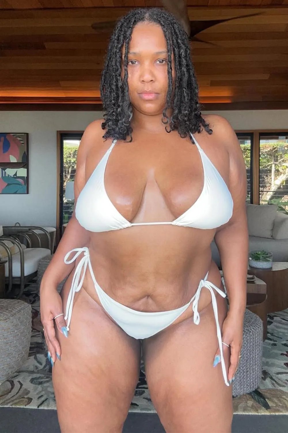 Lizzo Flaunts Her Figure in White Bikini for First Post of New Year