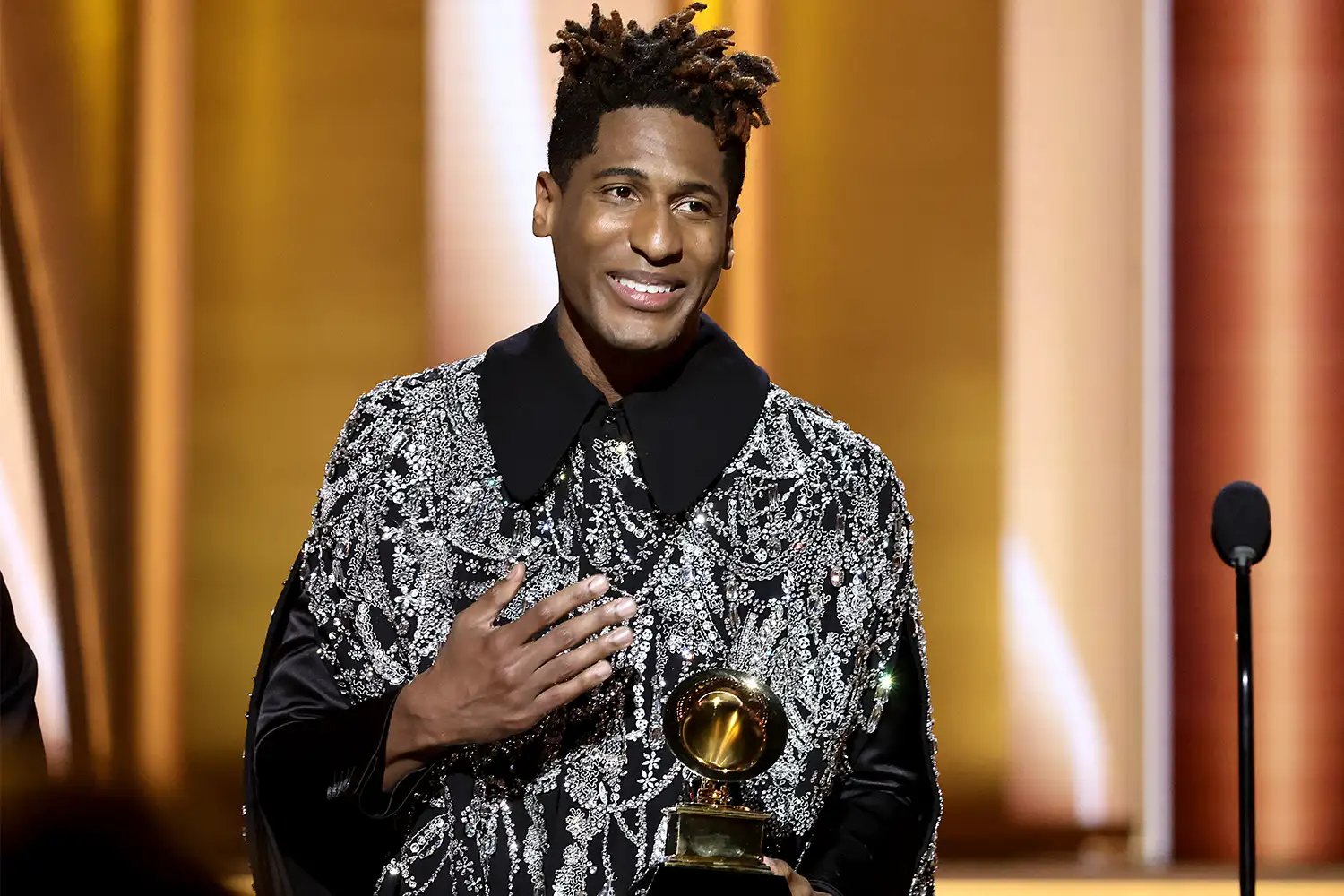 Jon Batiste accepts Album Of The Year for 'We Are' at the 64th Annual GRAMMY Awards.