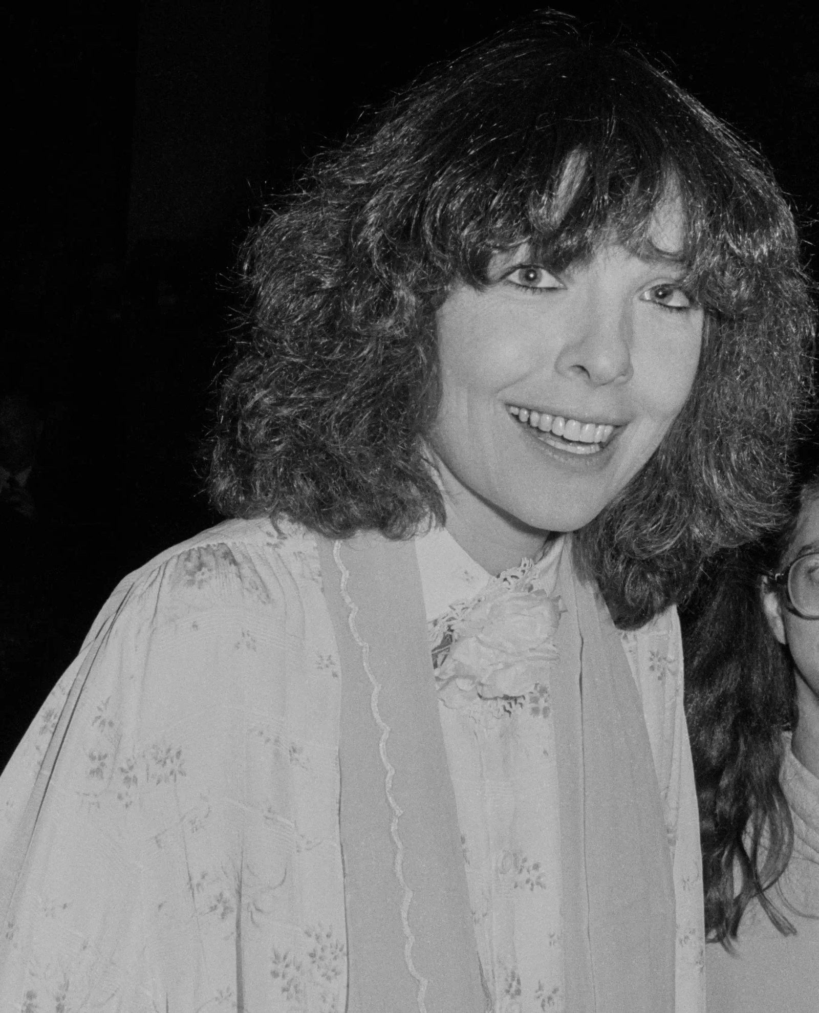 Diane Keaton wearing a flowered blouse and scarf; circa 1970; New York.