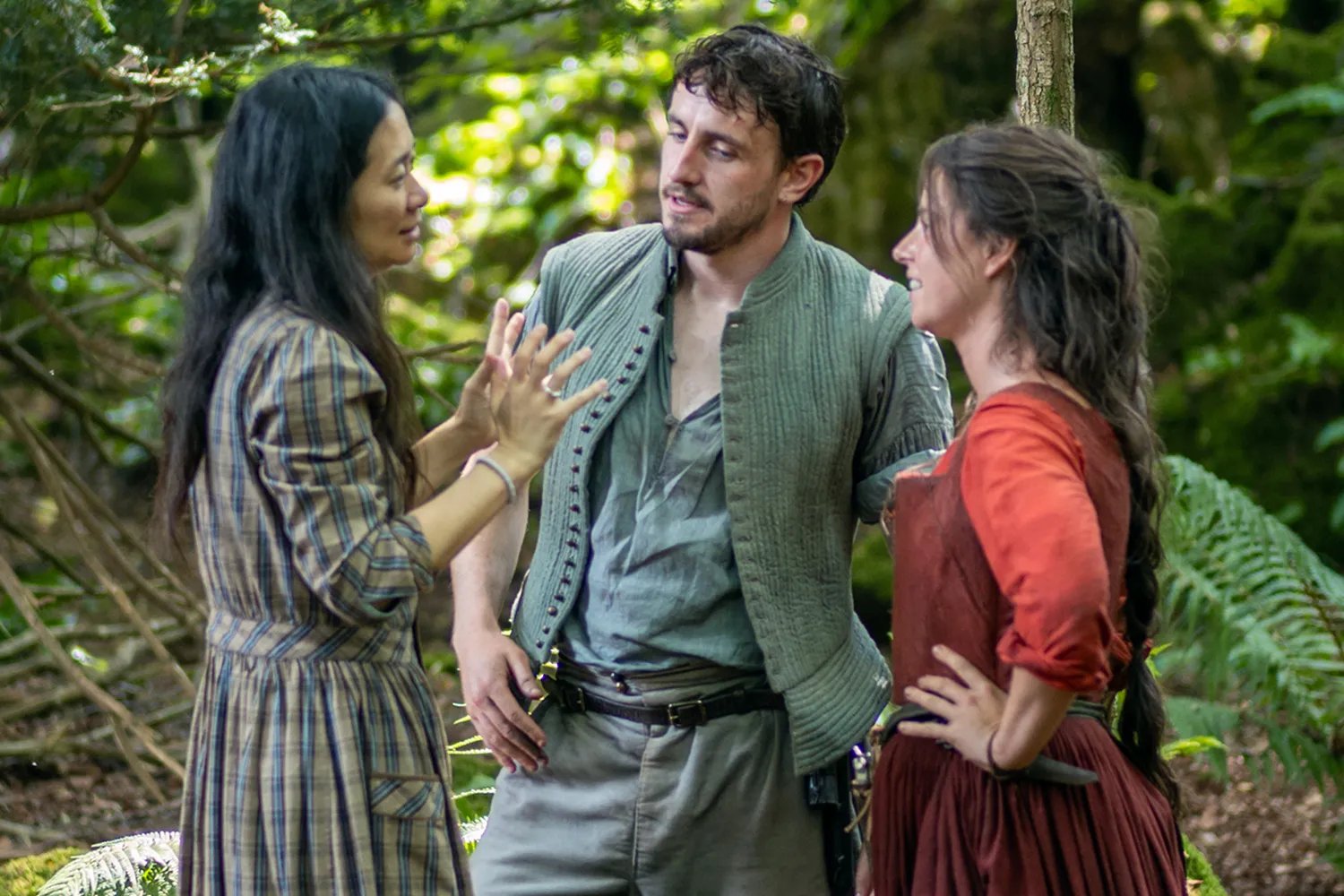 Chloé Zhao with actors Paul Mescal and Jessie Buckley on the set of their film Hamnet.