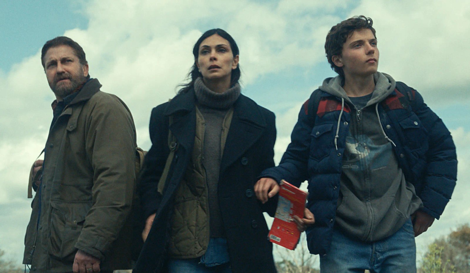 Gerard Butler as John Garrity, Morena Baccarin as Allison Garrity, and Roman Griffin Davis as Nathan Garrity in Greenland 2: Migration
