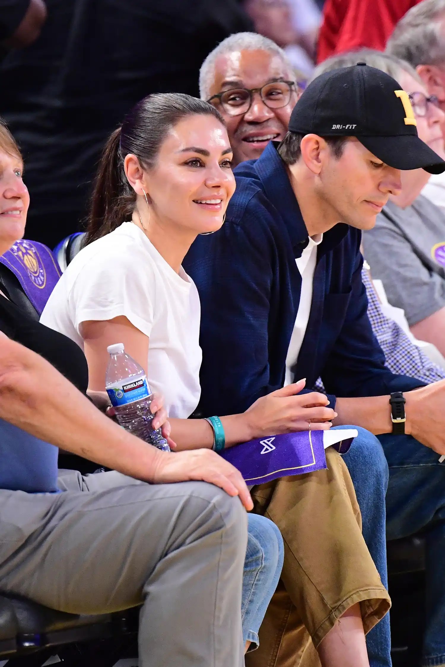 Mila Kunis with Ashton Kutcher on August 5 